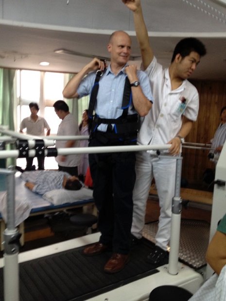 12. One of the specialities of the hospital was treating people who had had a stroke. In this photo I was volunteered to demonstrate some of the rehabilitation equipment.